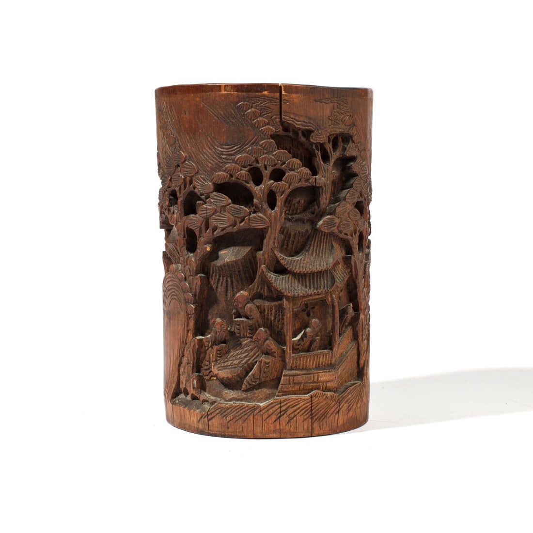 Chinese Carved Bamboo "Scholars" Brush Pot: Chinese carved bamboo brushpot / bitong depicting scholars within a temple building and bamboo grove between rocks and pine trees. Carved in high openwork relief. Early 20th century. Drilled; some sma