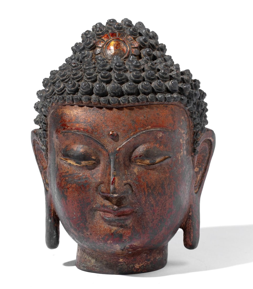 Chinese Cast Bronze Buddha Head: Vintage Buddha head sculpture in heavy bronze with intricate cast details. Worn lacquer over gilt surface to skin areas. Blue lacquer to hair. Excellent condition with age patina. 7" H. 9 lbs approx.