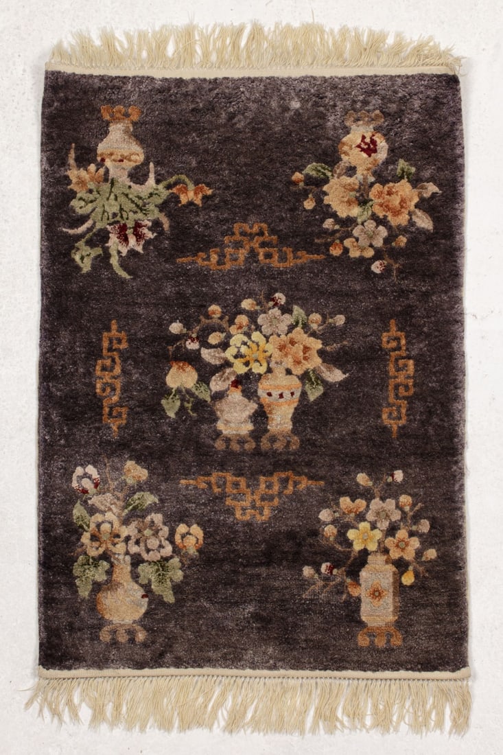 Vintage Chinese Art Deco Scatter Rug: Vintage Chinese Art Deco Scatter Rug. Amiri Carpet Importers tag on underside. Wool and silk over cotton warp. Iridescent purple feild floral decoration, gold scroll work at center. High pile. 36x24" 