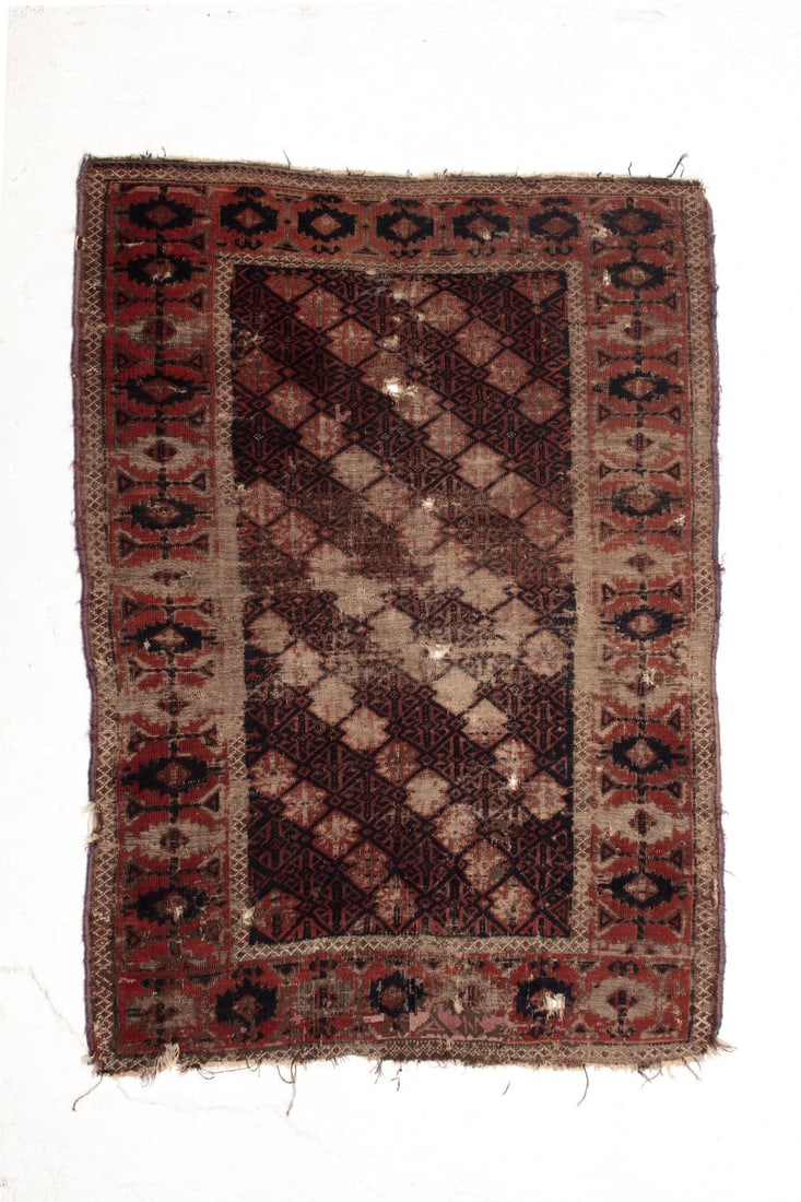 Antique Baluch Rug: Antique circa late 19th/ early 20th century wool on wool hand-knotted Baluchi rug. Much wear, some holes, small losses, etc. 3' 1" x 4' 1" approx.