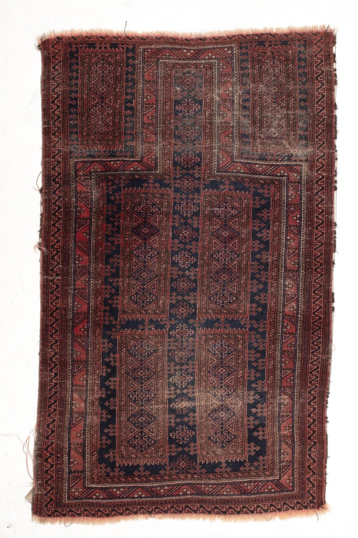Vintage Afghan Baluch Prayer Rug: Vintage wool on wool hand-knotted Baluchi prayer rug. Much wear, some holes, small losses, some dye bleeding, etc. 2' 11" x 4' 10" approx.