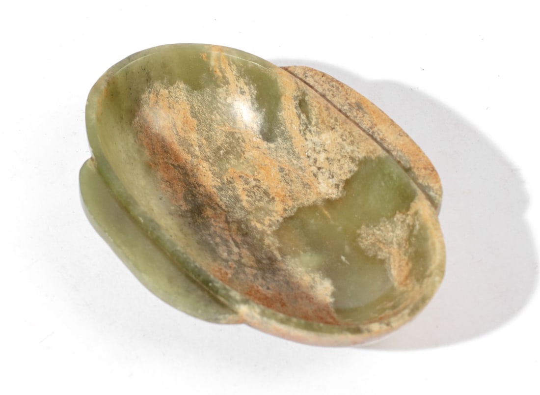 Antique Chinese Jade Earred Oval Cup / Han Style: Han style / Ming Dynasty carved green and tan jade oval cup carved with flat "ear" extensions to each side. Very good conditition. 1" H x 4 7/8" x 3 1/2" approx.