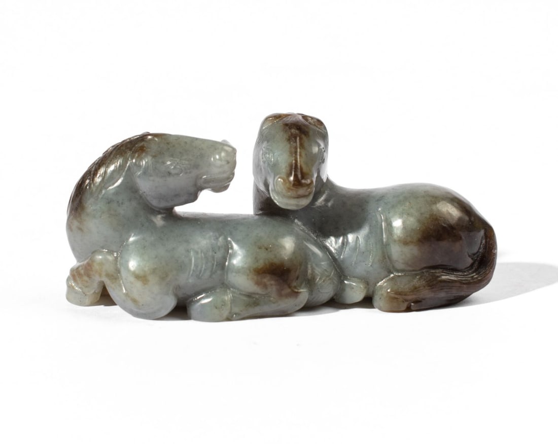 Chinese Grey & Brown Jade Horse Group: 20th century Chinese grey & brown jade horse group carving. Depicts two horses resting; well carved and using the jade color variations to good effect. Good condition. 1 3/4" H x 3 5/8" L x 1 1/4" W a