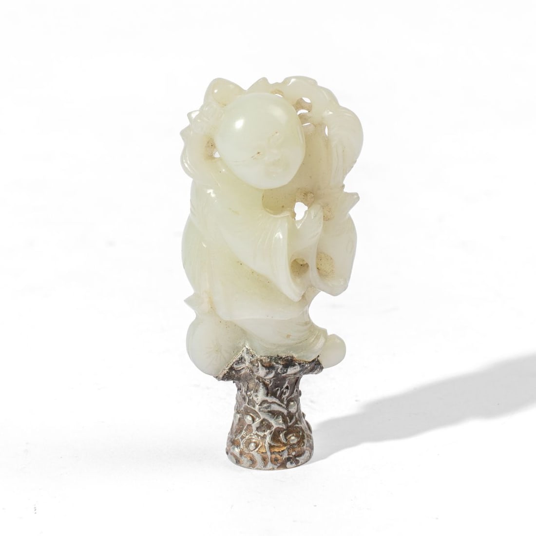 Antique Chinese White Jade Boy Figure: 19th C. Chinese carved white jade figure of a boy holding a lotus flower with long stem. Mounted as a lamp finial. Good condition. Figure 2" approx. Total height 2.75" approx.