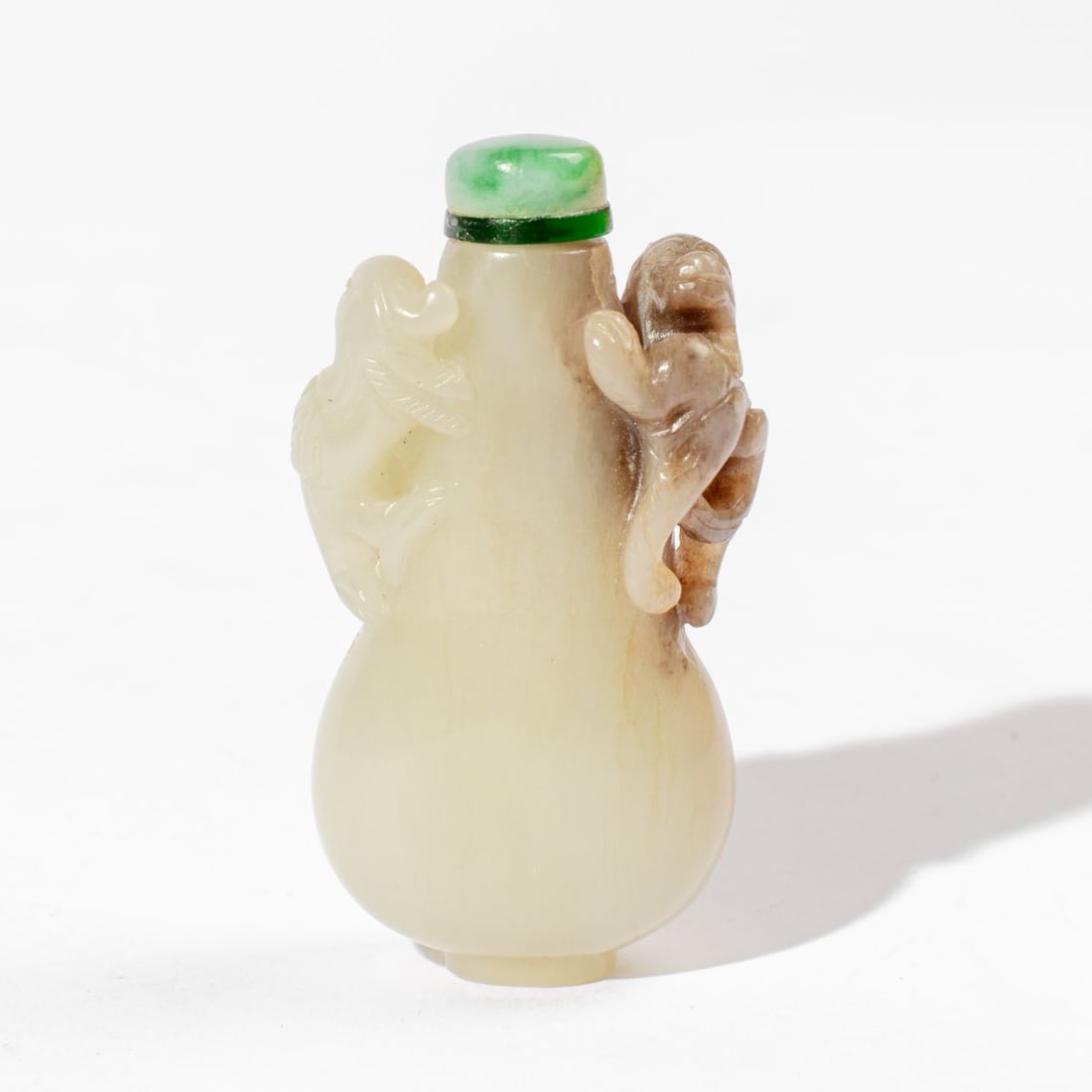 Chinese Jade Dragon & Phoenix Snuff Bottle 19th C: 19th century Chinese pale green and grey jade snuff bottle. Gourd form with carved figural dragon and phoenix bird to each side of the neck. Good condition. 2 7/8" H.