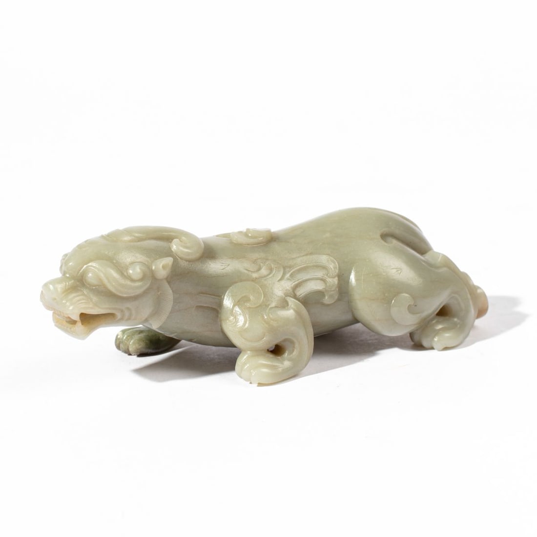 Ming / Qing Chinese Jade Luduan Figure: Ming or early Qing dynasty pale green jade figure of a Luduan creature. Finely carved with flourishes to haunches and tail. Label to underside: J.C. BULLER - A.M. CLARKE "Jade Haven Galleries" 0634. R