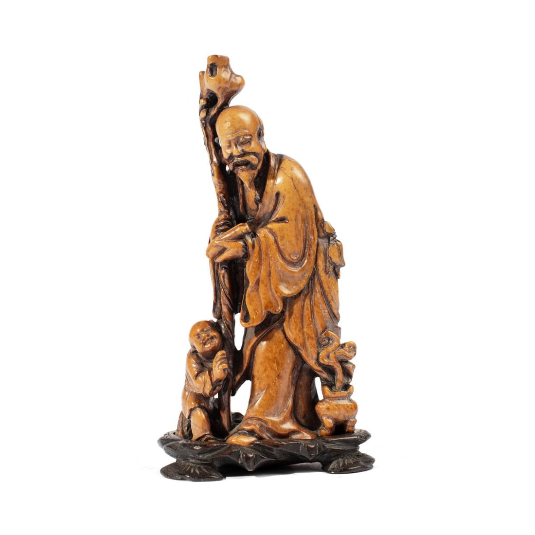 19th C. Chinese Soapstone Carving Shao Loa: 19th century Chinese soapstone carving of Shao Lin with attendant; incense burner about to catch his robe on fire. Incised 2-character mark to bottom. Includes custom carved wood stand with lily pad f