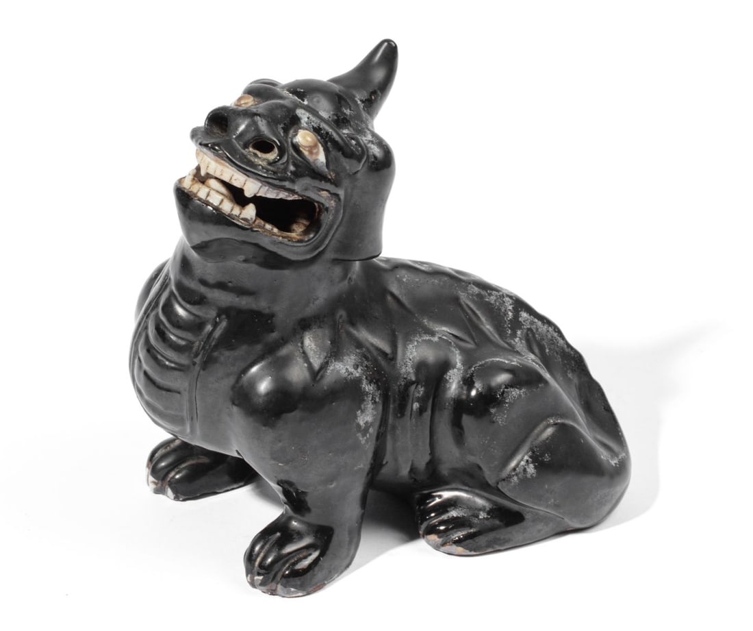 18th C. Chinese Black Glazed Luduan Animal Figure: 18th century Chinese black glazed Luduan animal figure. Fierce open mouth expression showing teeth and open nostrils. Excellent condition with some black glaze flaws to creature's right front paw tips