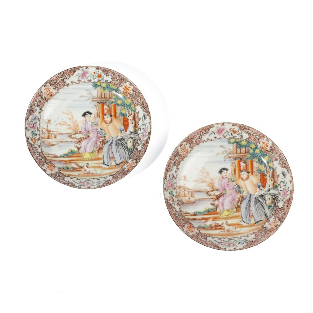 Pair 18th C. Chinese Famille Rose Dishes: Pair 18th century Chinese Famille Rose dishes with matching figural scenes and intricately painted borders. One dish in excellent condition; the other with small rim chip and hairline crack from rim t