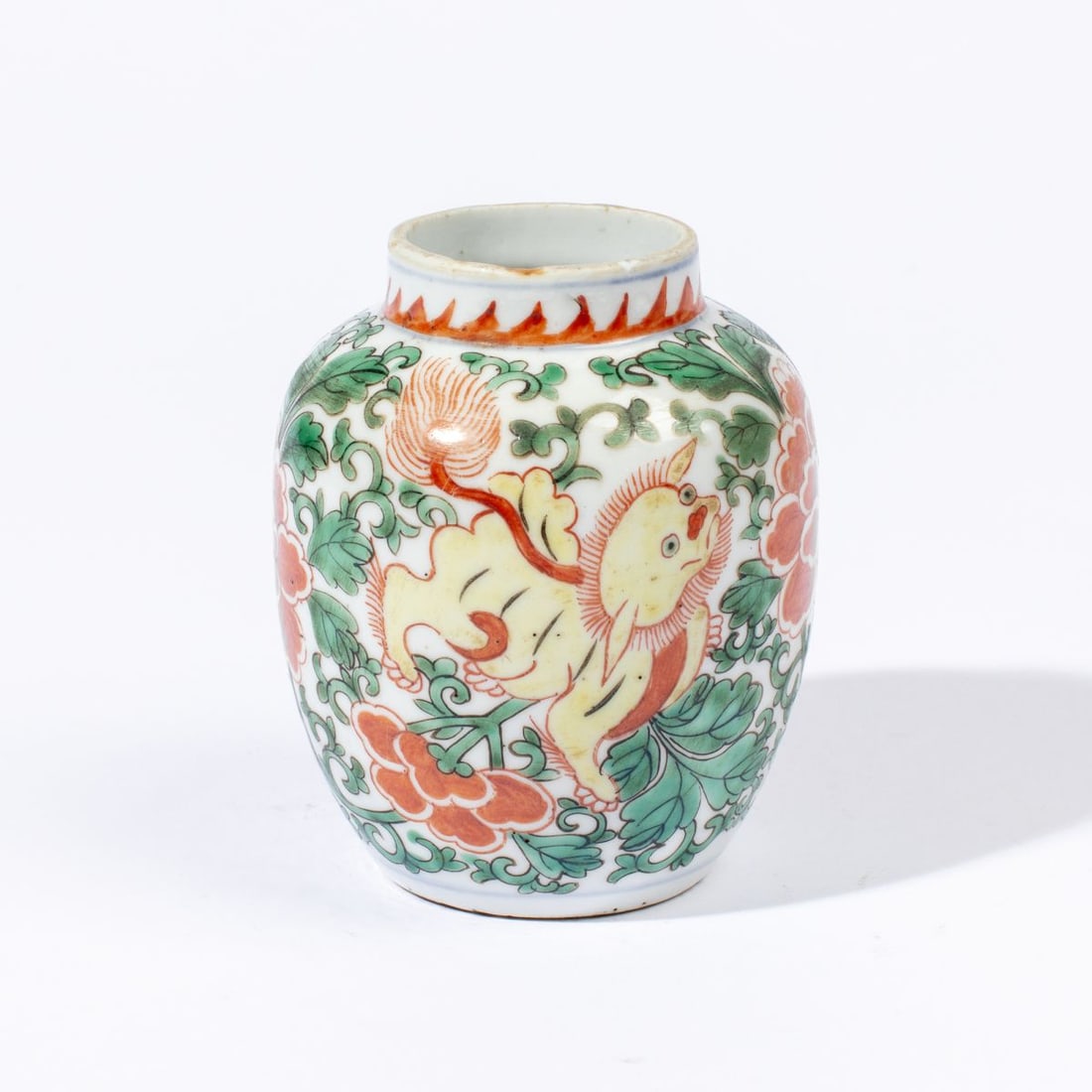 17th C. Chinese Jar with Foo Lions/ Shunzi Period: Shunzhi Period (1644-1661) Chinese transitional Wucai jar decorated with yellow lions, red flowers, and green trailing vines. Unglazed bottom. Good condition; a few very minor rim nicks. 4 3/8" H appr