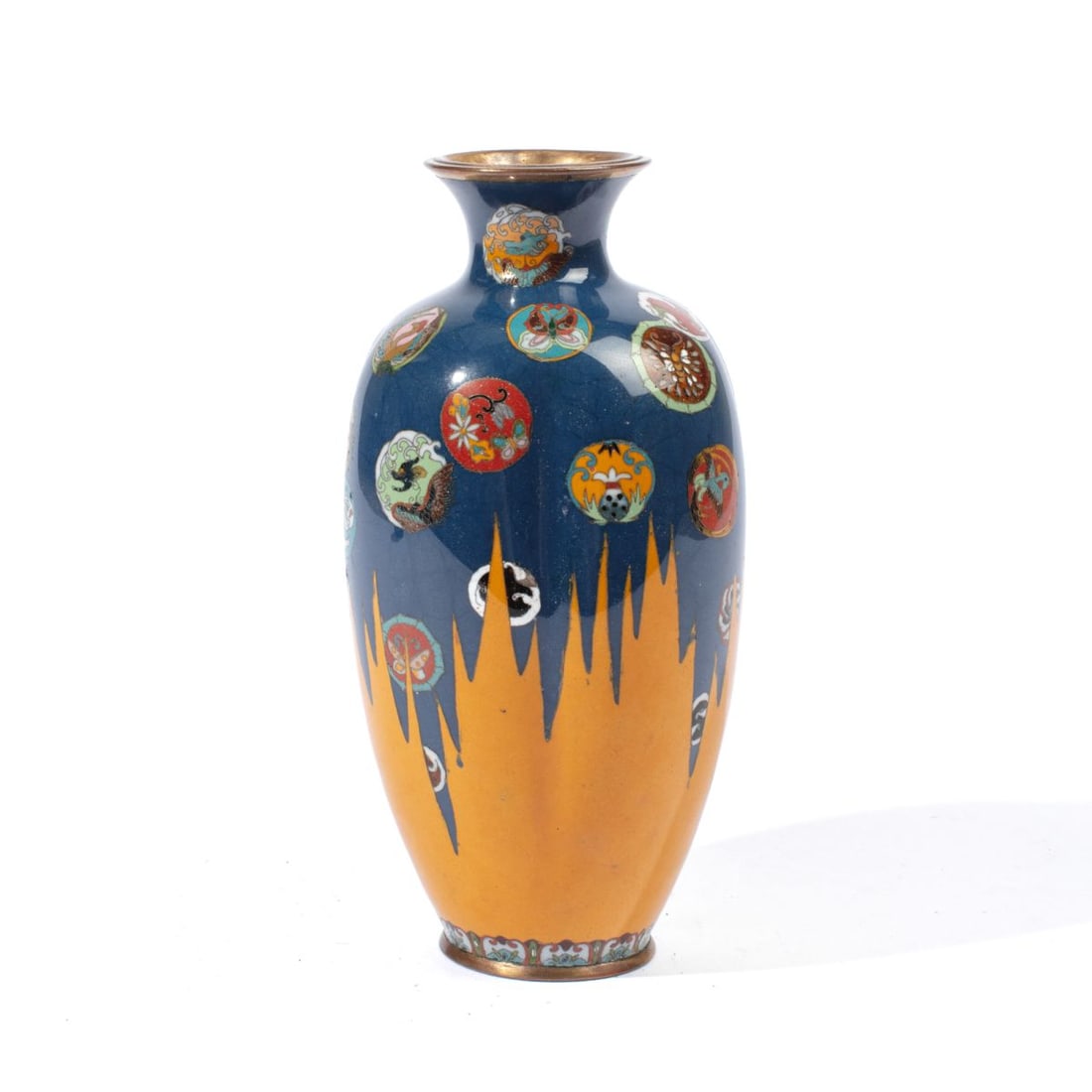 Antique Japanese Silver Wire Cloisonne Vase: Early 20th century Japanese silver wire cloisonne vase. Lobed body with intricate roundels on blue ground above a mustard colored bottom. Very good condition with one small ding or flaw. 7.25' H appro
