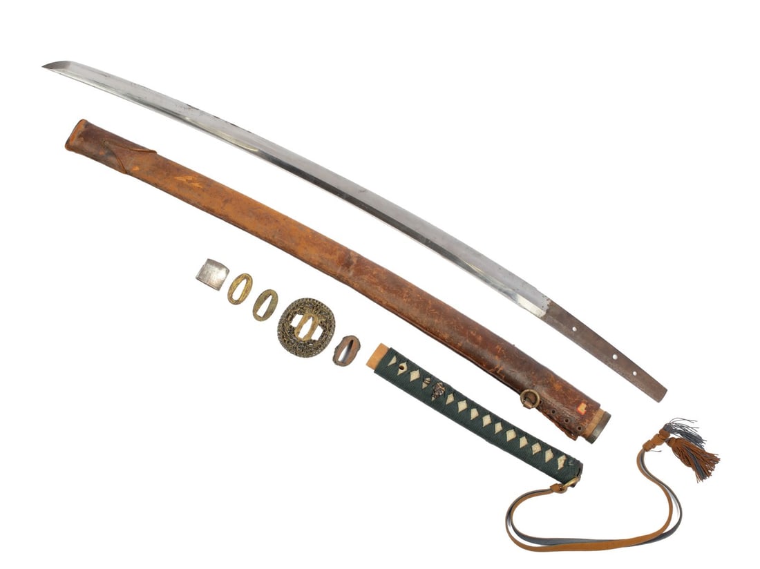 Antique Japanese Katana Long Sword: Antique Japanese Edo Period Katana Long Sword. Signed fuchi with elaborate shishi dog and flower raised decoration with gold and brass inlay; matching flower kashira. Blade measures 25" visible with 3