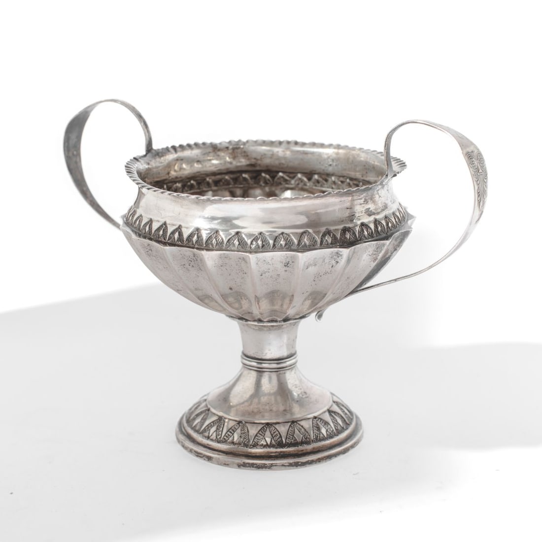 Spanish Colonial Silver Double Handle Cup / Urn: Antique circa 19th century Spanish Colonial hand hammered and chased double handle cup / urn / bowl. UNTESTED AND UNKNOWN IF ANY SILVER CONTENT. Maker's stamp "AM" in Gothic script to each handle and 