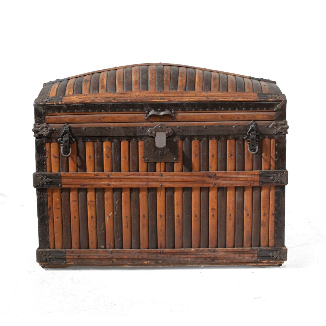 Martin Maier Oak Slat Dome Top Steamer Trunk: Good solid original condition with age patina; missing leather handle straps. 29" H x 35.25" W x 21.25" D approx.