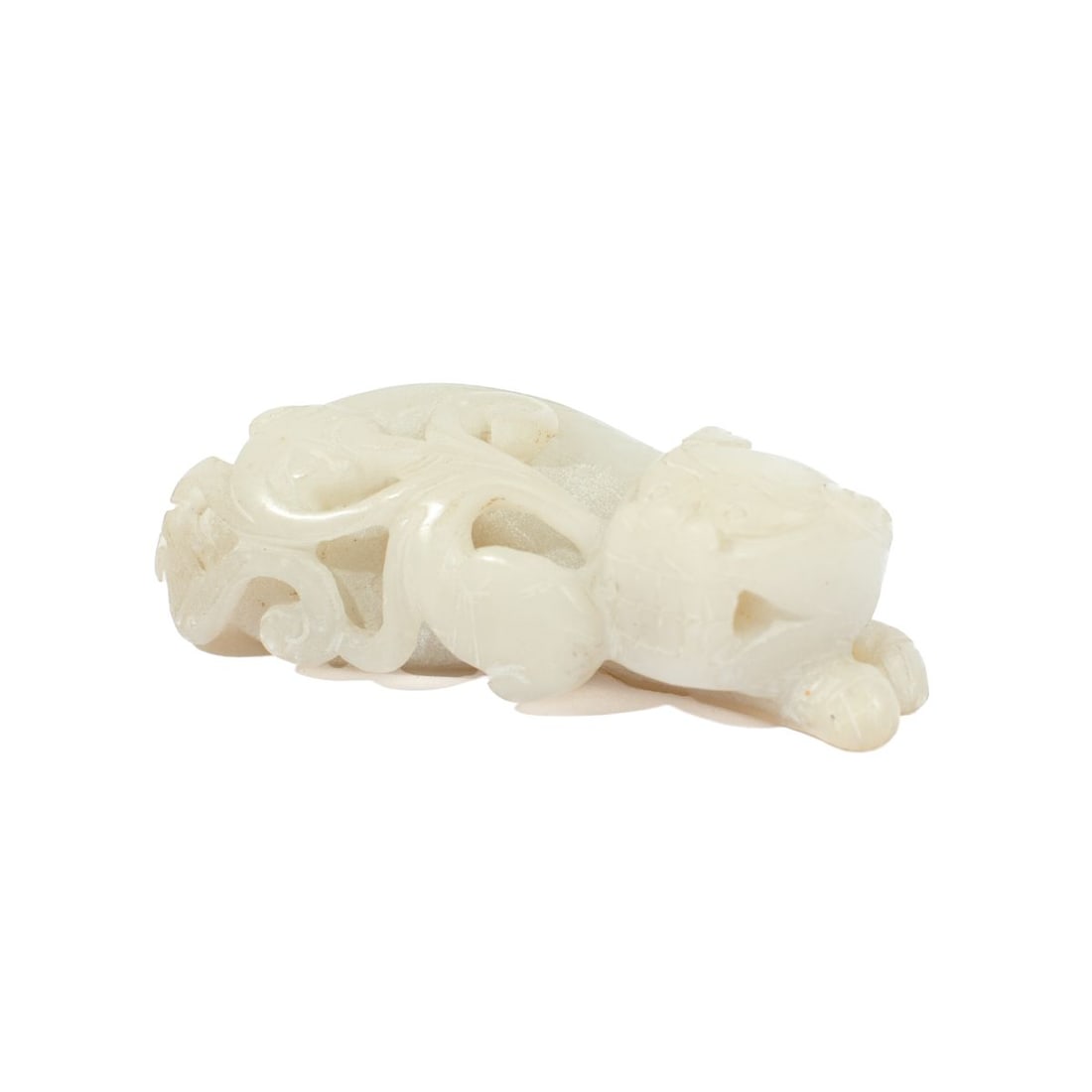 Chinese White jade Chilong Figure Ornament: Chinese white jade Chilong figure or scholars ornament. Beast in a recumbent pose . Possible nick to one ear. 2.5" long X .625" high