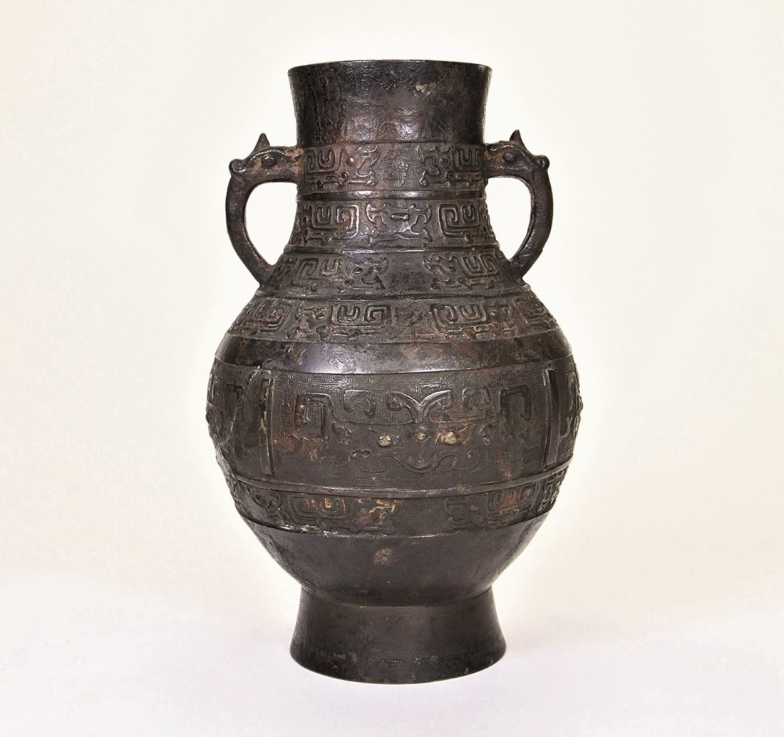 A BRONZE TWO HANDLE VASE-MING: A BRONZE TWO HANDLE VASE-MING 明古銅獸面紋雙耳尊 ◆size:H36cm PROVENANCE：Japanease Collector AUCTION Catalog:https://book.yunzhan365.c
