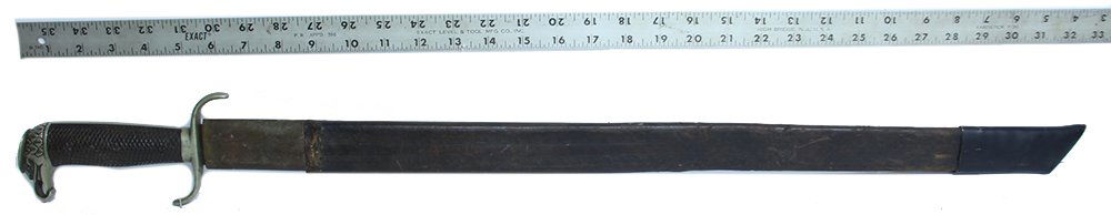 SPANISH AMERICAN WAR SPANISH FIGHTING MACHETE: These long machetes with parallel edges are related to their working cousins, but are known as "fighting machetes" or "Cutachas." This is the standard army pattern sometime denoted the Model 1891, and