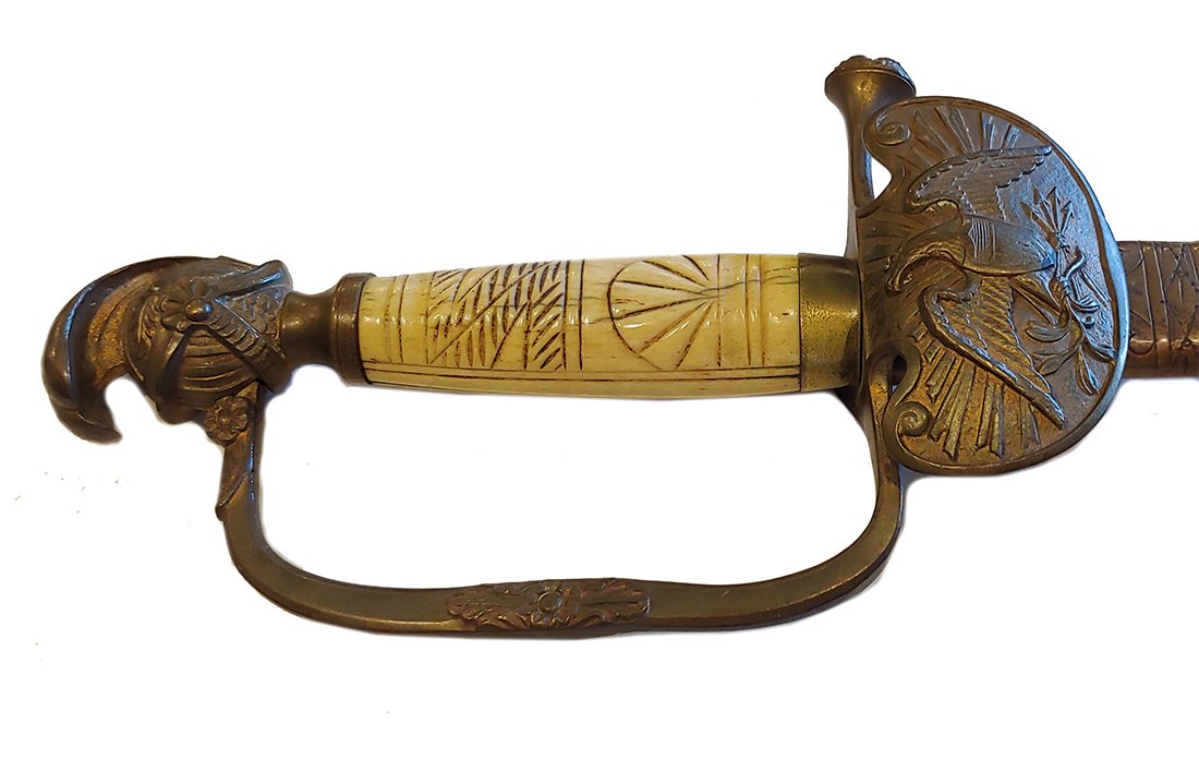 Mexican War Era Officers Sword: Very handsome 1840s straight bladed US non-regulation officer's sword. Knights head pommel. Carved bone grip. "D" pattern knuckle guard. Ultra handsome American Eagle clamshell guard. Engraved brass s