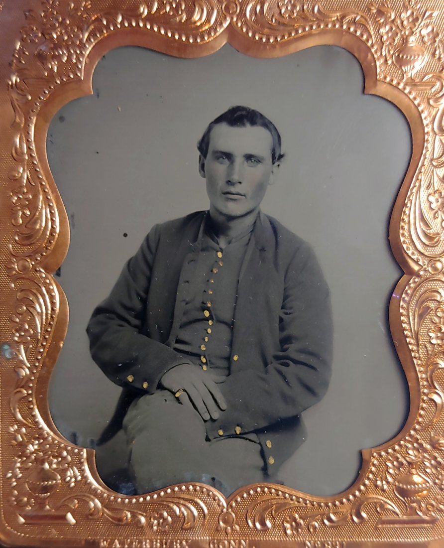 TINTYPE CIVIL WAR INFANTRYMAN 14th OHIO INFANTRY: Sixth plate tintype Yankee infantry soldier wearing uniform jacket and military vest. Fresh out of an old house in Massillon, Ohio. Image is superb. Back of tintype has a nice revenue stamp with a wea