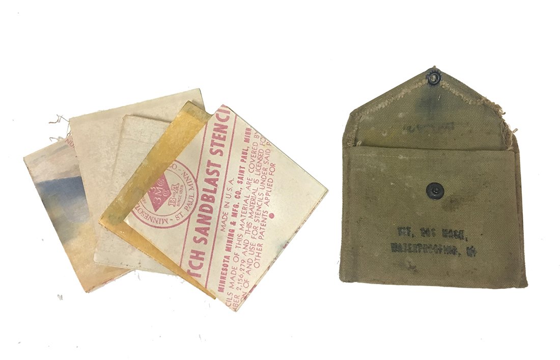 World War Two WW2 WWii Gas mask Waterproofing Kit: Rougly 5 inches by 5 inches. Green canvas pouch stenciled KIT GAS MASK / WATERPROOFING M1 and US and something else. Inside are several sheets of thick paper like substances marked by the forerunner o