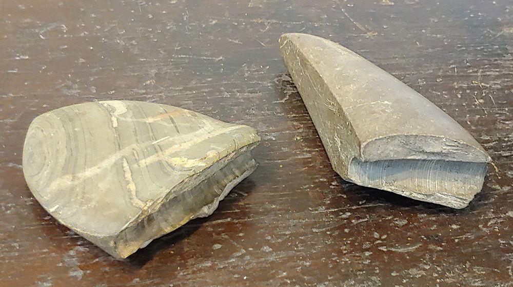 Native American Indian Artifacts Slate Gorgets: An interesting pair of relic slate gorgets that are unfortunately broken. These were drilled through the wide part of the gorget as opposed to the thin part. I usually see gorgets with two or three ho