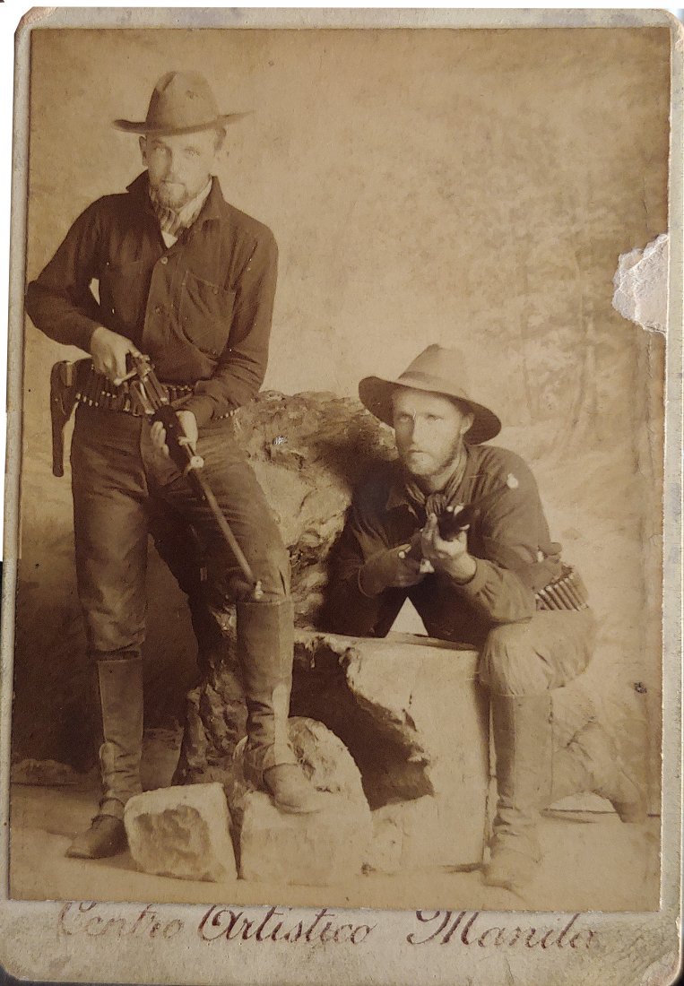 CDV Photo Bad Ass US Cavalry Troopers Carbines & Colts: A dynamically posed shot of two US cavalrymen on alert and ready for action. The cabinet card measures 4 by 2.75 inches and bears a Manila photographer's imprint of the "Centro Artistico," or "Artisti