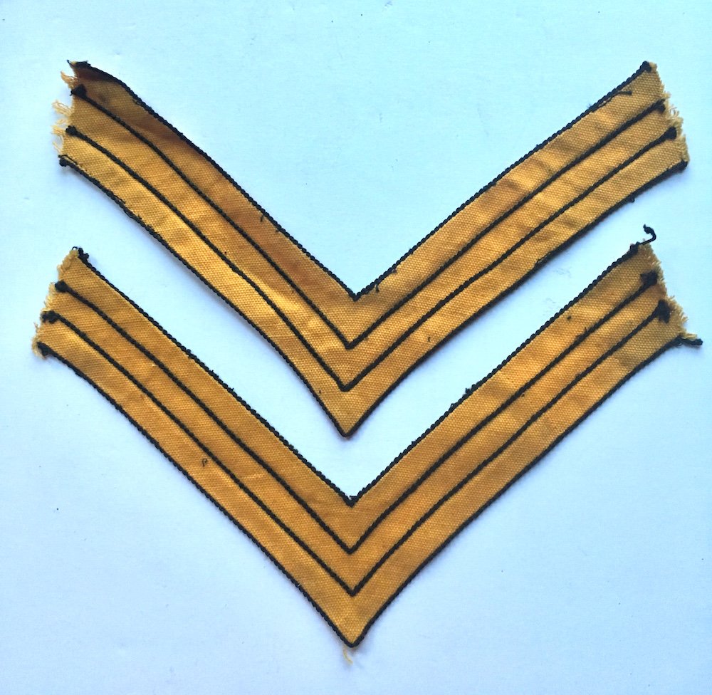 US Cavalry Sergeant Chevrons 1872 Pattern: Original set of US cavalry corporal's chevrons, pattern of 1872. Cotton drill with chain stitched borders and dividing lines. Good condition and good color. Minor dust from storage and a few stitching