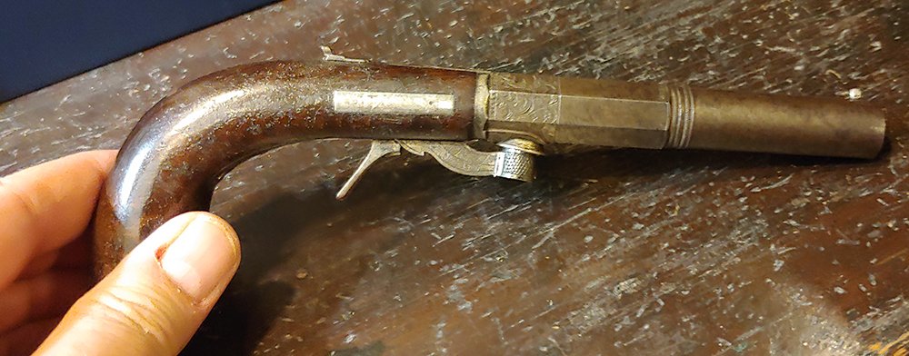 High Quality Silver Mounted Underhammer Pistol: Roughly .40 caliber. 8 inches overall length. 4 inch barrel. Under-hammer, folding trigger , percussion coat or boot pistol. Very fine craftsmanship. Silver mounted, finely engraved, well fitted and f