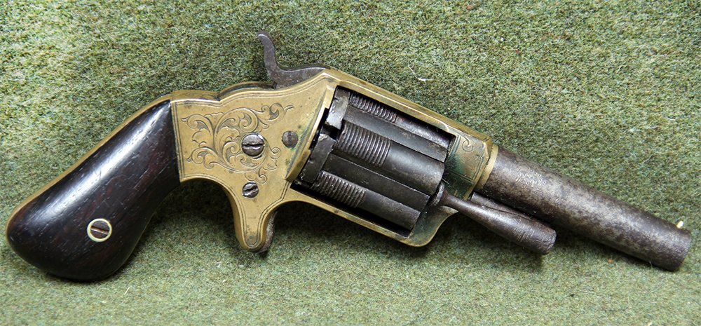 CIVIL WAR SLOCUM REVOLVER: You have to love the Slocum. The flanged cylinder chambers give it a distinctly futuristic look, but the scroll engraving on the frame is very Victorian, and the combination is somewhat startling. The