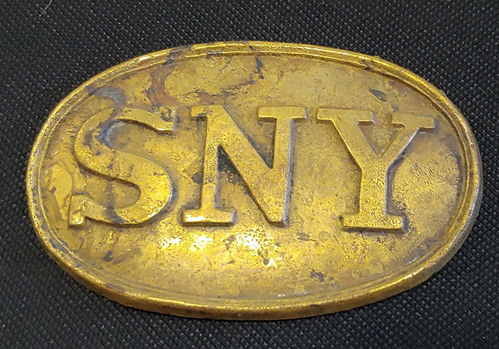 Civil War SNY New York Belt Buckle: New York oval belt plate with letters SNY, representing STATE of NEW YORK. Very good and a shipwreck recovery manufactured with iron wire hooks which have rusted off. These iron wire examples are a ve