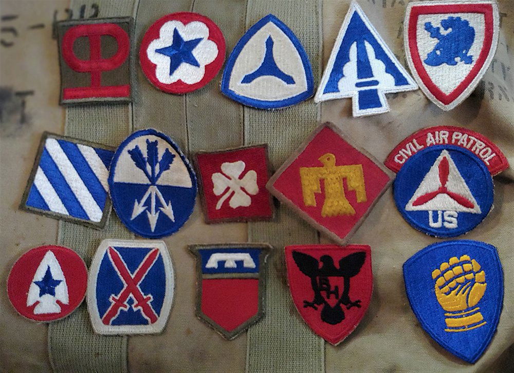 Nice Lot of 15 World War Two Patches: I just bought a cookie tin full of patches. Here are 15 genuine ww2 wwii patches in one lot. Opening bid is a gift, NO RESERVE!These can be mailed in a large envelope for $3