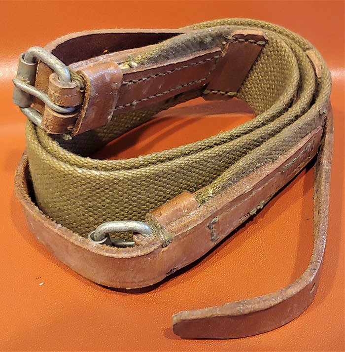 Cloth & Leather Military Mauser Rifle Sling: -NO RESERVE-Totally out of my area. ww2 ? world war two ? wwii ? Green web cloth with leather billets sewn in place. Roller buckle. Arsenal marks inside the leather billet are unknown to me. Not sure 