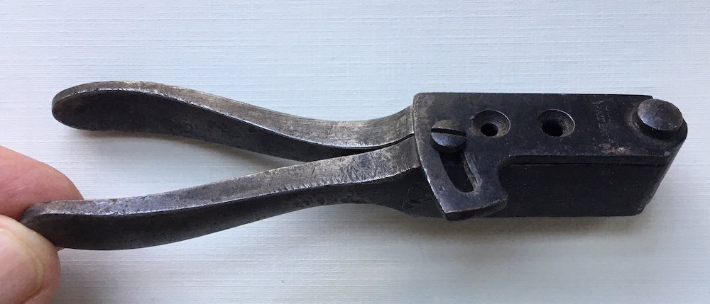 COLT NAVY BULLET MOLD: -NO RESERVE-Bullet mold for the Colt .36 caliber Navy revolver. Colts Patent marking on the sprue cutter. Some blue on the sprue cutter and block, both outside and in. Handles are gray, with some ding