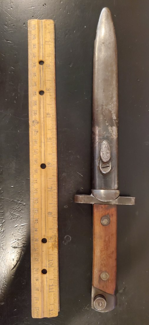 ITALIAN CARCANO BAYONET: -NO RESERVE-Bayonet and scabbard for the Italian Carcano. Wood grips with initials LAS on one panel and issue numbers on blade tang.