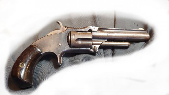Smith & Wesson No. 1 1/2 Wild West Revolver: This is a strong example of the S&W .32 caliber Model 1-1/2 Single Action Second issue five-shot revolver made in desirable niter blue finish. The .32 caliber Model 1-1/2 SA was produced from 1878-189