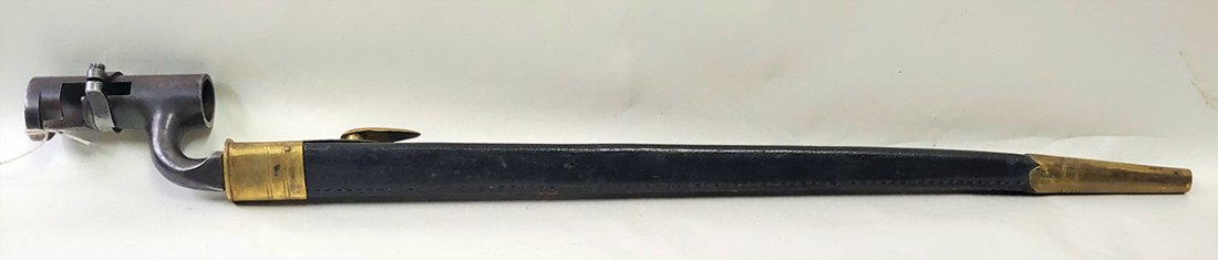 Exceptional Civil War Enfield Bayonet and Scabbard: Extra fine condition P1853 Enfield Rifle Musket socket bayonet and scabbard. Bayonet socket retains generous amts of original blue, and the blade exhibits most of the original arsenal polish. Top Draw