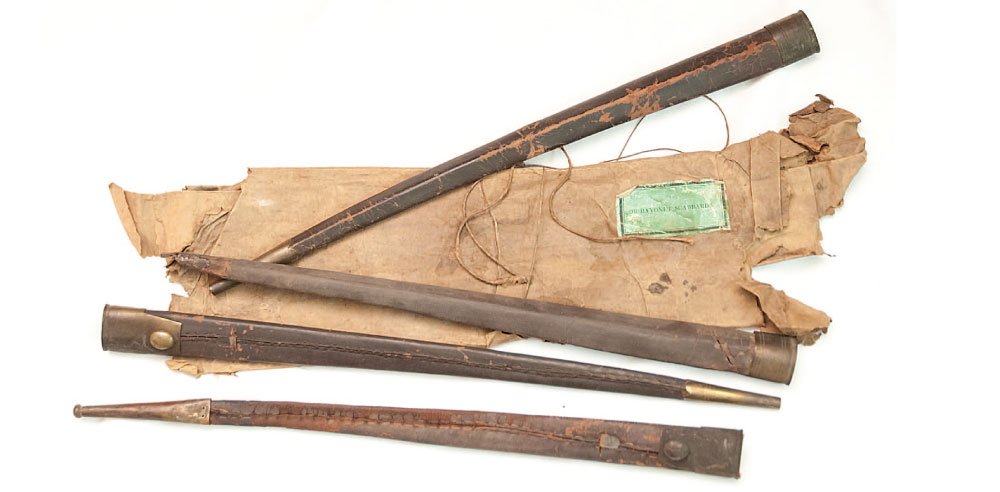 War of 1812 Package of Bayonet Scabbards: Incredibly Cool 1812 to 1820s Arsenal Pack of Bayonet Scabbards: The scabbards are similar to 1816 US patterns with brass throats and tips, but they are British for the Brown Bess muskets. There are f