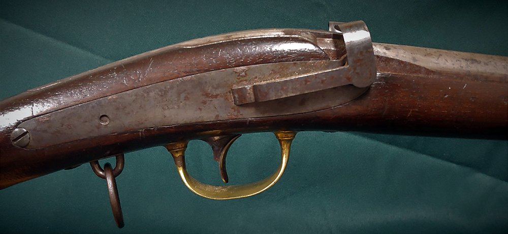 Civil War Jenks Carbine: JENKS -MULE EAR- CARBINE This Jenks rates very good for condition. The wood has nice color and finish with a tight fit to the metal and just some small handling dings with a small check on the lower l