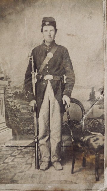 Civil War CDV Photo Armed w Musket & Bayonet.: A fine condition full standing portrait of an armed soldier from Quincy Illinois. He has his Enfield rifle musket held upright at his side. Slight fading and some handling age but very nice. This can 