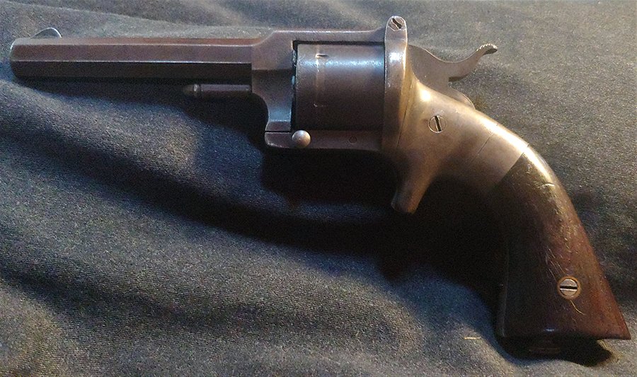 Civil War Pond Revolver Made for Smith & Wesson: Very Good Pond pocket revolver chambered in .32 rimfire as manufactured in Worcester, Massachusetts circa 1863. The Pond Revolver was a patent infringement of the Rollin White DRILLED THROUGH CYLINDER