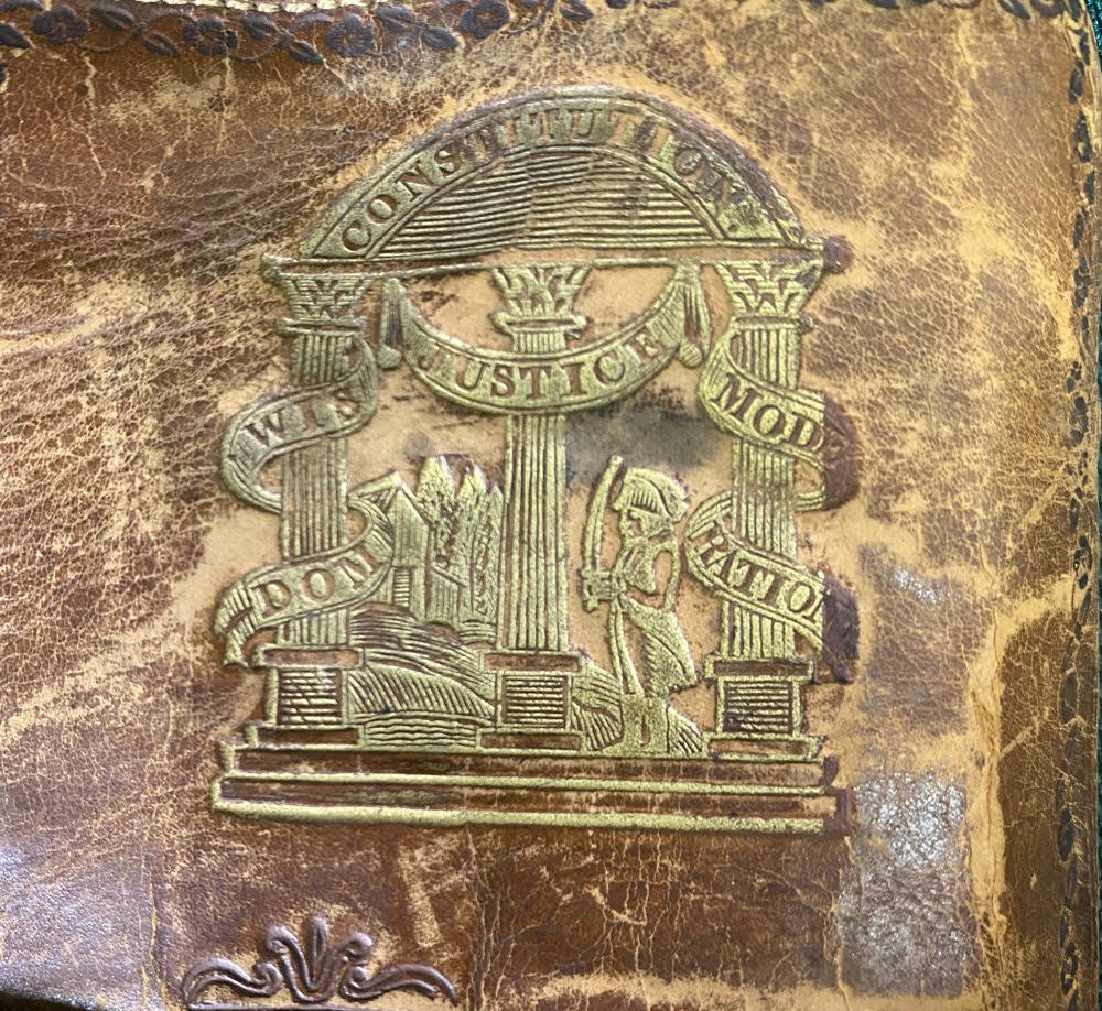 Confederate Georgia Wallet: Truly enchanting Civil War or earlier man's leather wallet embossed twice with the Georgia state seal. I have never previously seen such an embossed wallet pertaining to a Confederate state. The colle
