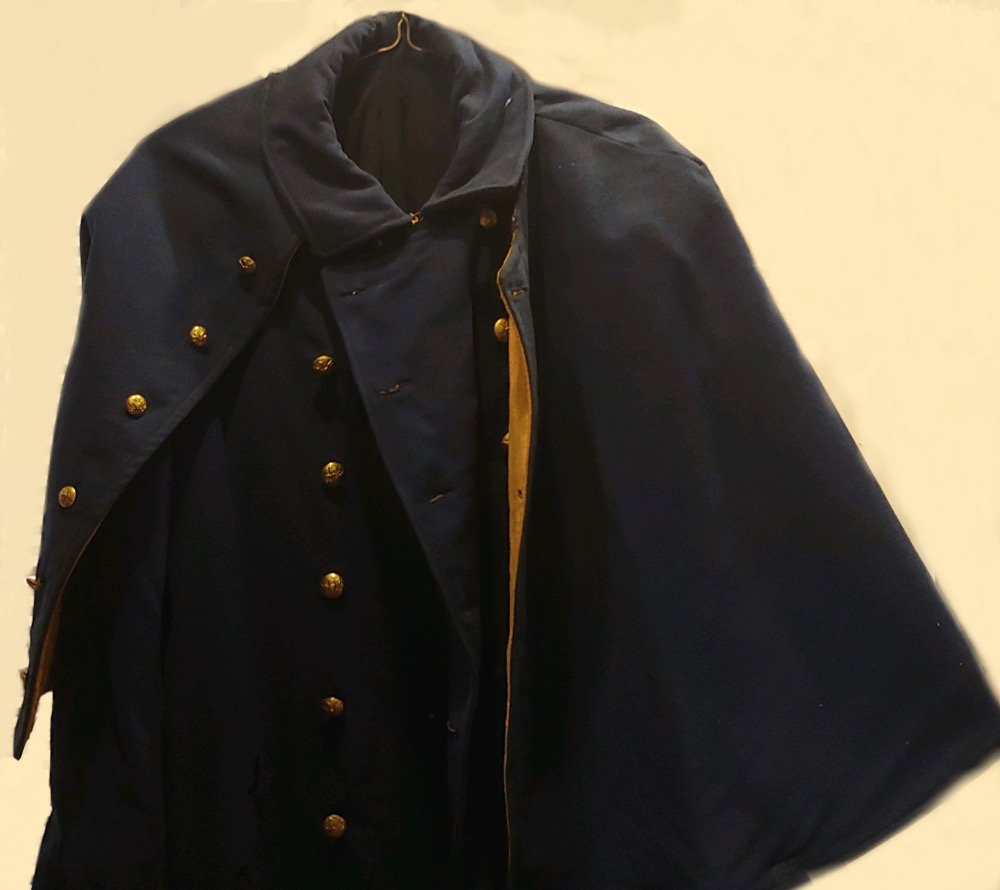 Regulation US Cavalry Indian War Greatcoat: This coat came with the Jefferson Guard 1904 world's fair uniform in the previous lot and was worn at the fair during the cold months. Regulation US Cavalry 1884 or 1885 overcoat in good to VG conditi
