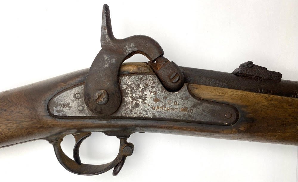 Dead Real 1861 Springfield Musket dated 1861: Looks like an old barn find. This one is a real 1861 Springfield Made in 1861. It is 100% complete 100% original mechanically good And very scarce. This musket unquestionably saw service through all 4