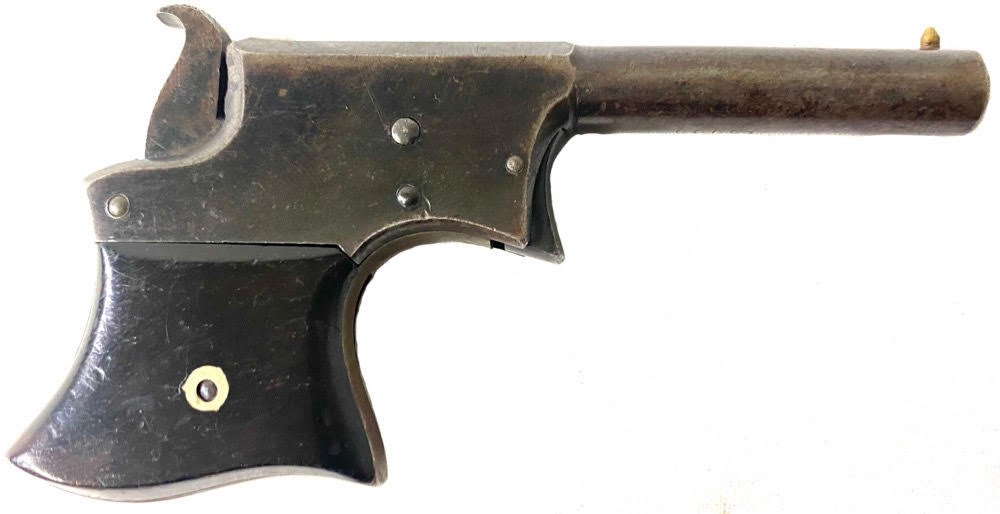 Remington Vest Pocket .22Caliber Pistol: Manufactured from 1865 to 1888, the Remington No. 1 Vest Pocket Pistol is also known as the Saw Handle Derringer. The top of the barrel is marked with the two line address/patent date marking, and the