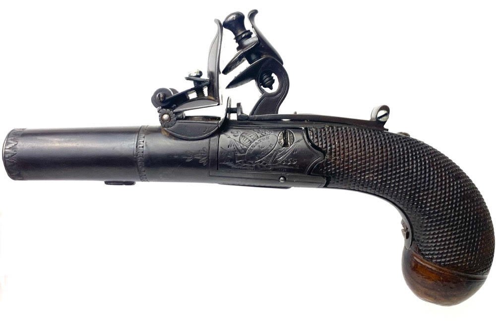 Box Lock Flintlock Muff Pistol: A very well made derringer size flintlock pistol signed by makers HEATON & SMITH LONDON. Very well executed. Formal walnut grip is richly checkered over 80% of the wood with complete coverage... check