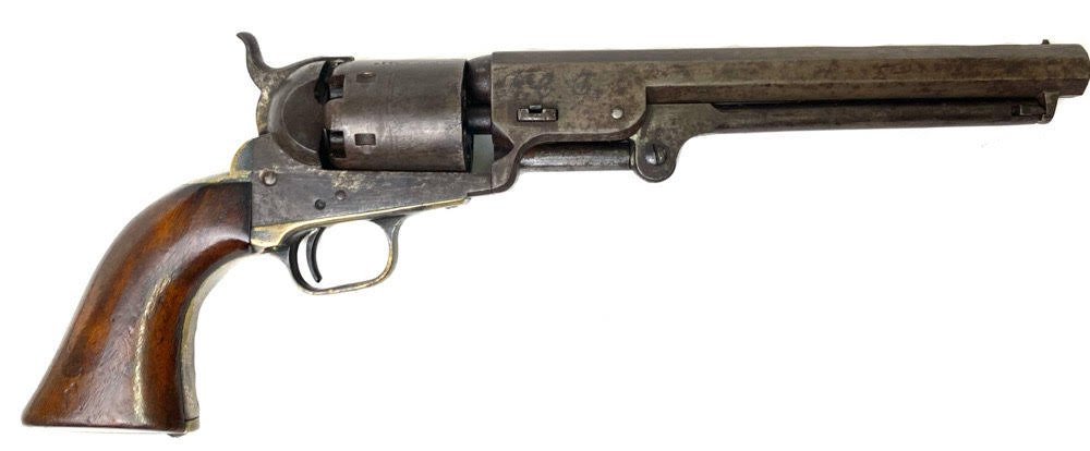 1851 Navy Colt Revolver Made in 1851: First year of production Colt Navy revolver serial number 4114. Has the classic early features including small trigger guard, no capping groove in the recoil shield, and heavy silver plate. Barrel leg