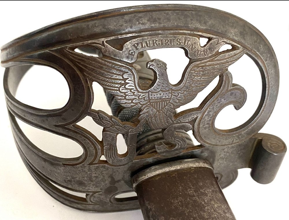 Heavy Duty Extra Beefy Peterson #75: This eagle in steel guard sword is designated as Peterson 75 by collectors on the basis of its plate number being 75 in Harold Petersons book The American Sword. These were real field swords, often pr