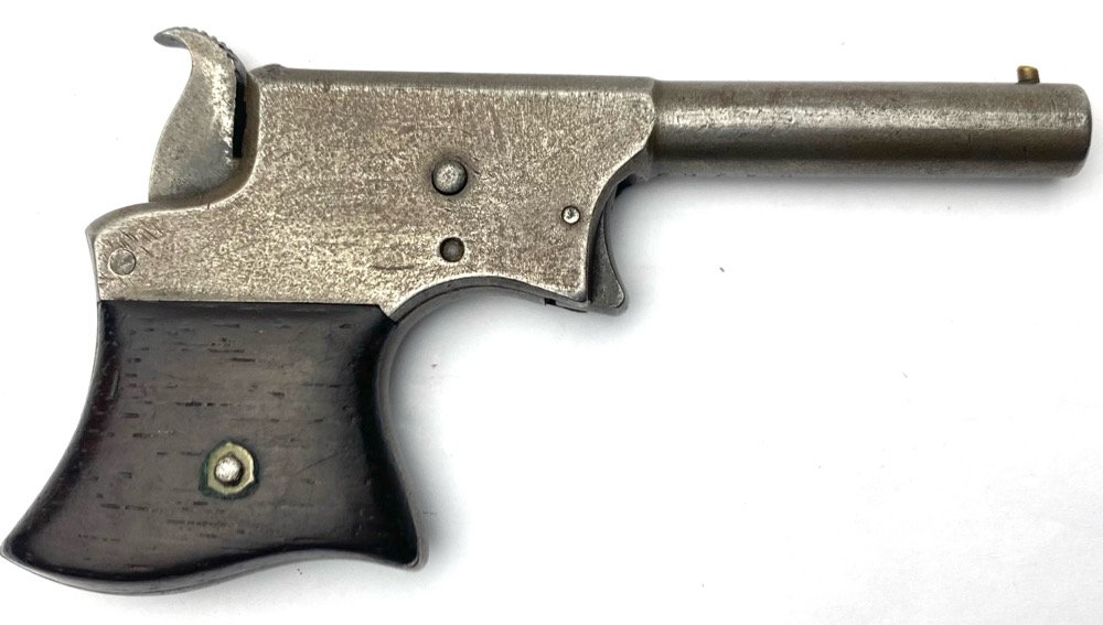 REMINGTON VEST POCKET SAW HANDLE DERINGER NO. 1: This was marketed by Remington as their No.1 Size, and was produced from 1865 to 1888 with a 3 3/4 inch round barrel in .22 caliber. Total run estimated at 17-22,000. The pistol has a flat profile for