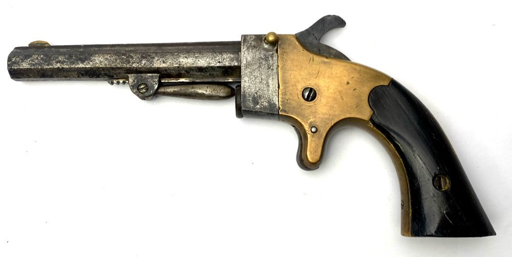E.L. AND J. DICKENSON SINGLE SHOT DERINGER: Scarce E.L. and J. Dickinson single shot derringer. Made 1863 to 1868 according to Flayderman. Others say only to 1865. Total quantity estimated under 1,600. Made in .22 and .32 Caliber, both with 3.7