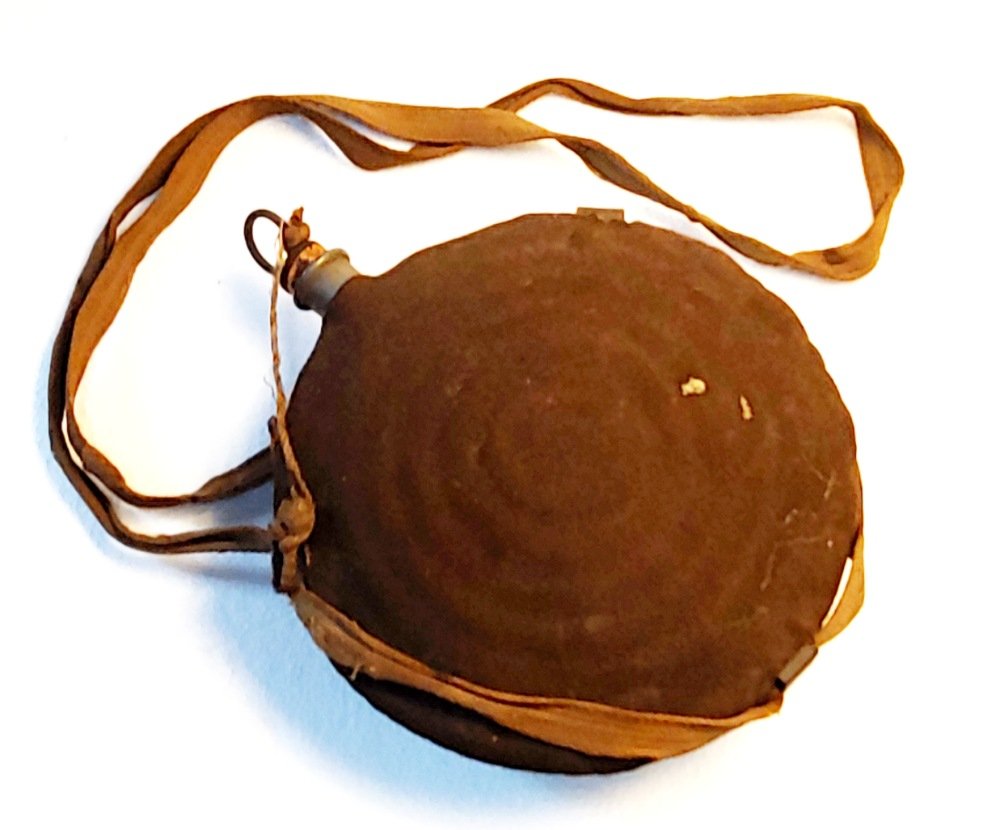 Outstanding Philadelphia Depot Civil War Bullseye cante: Great example of the Civil War bulls-eye canteen coming from the Philadephia Depot. These corrugated canteens with maker name on the spout came in around August 1862. This one in clearly marked on the